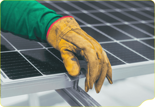 KASIsolar technician's hand resting on a solar panel